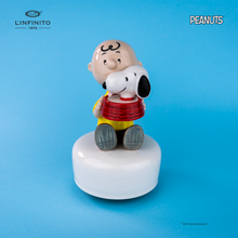 将图片加载到图库查看器，Statuina di Charlie Brown e Snoopy nella ciotola dell&#39;acqua, su carillon musicale.
