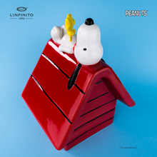 将图片加载到图库查看器，Statuina di Snoopy e Woodstock sulla cuccia
