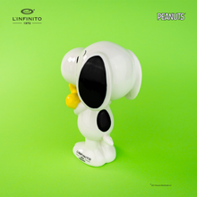 Load image into Gallery viewer, Statuina di Snoopy con in braccio Woodstock.
